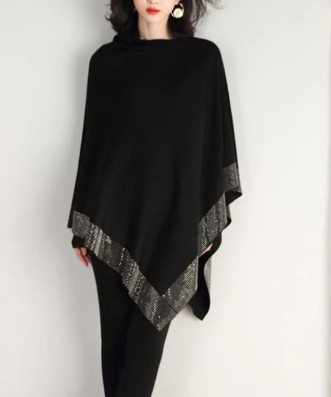 Damski sweter typu ponczo wykończony zdobieniem