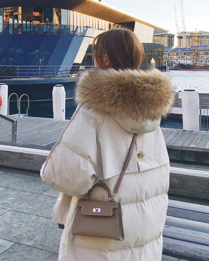 Damska kurtka zimowa ocieplana z kapturem długości przed kolano