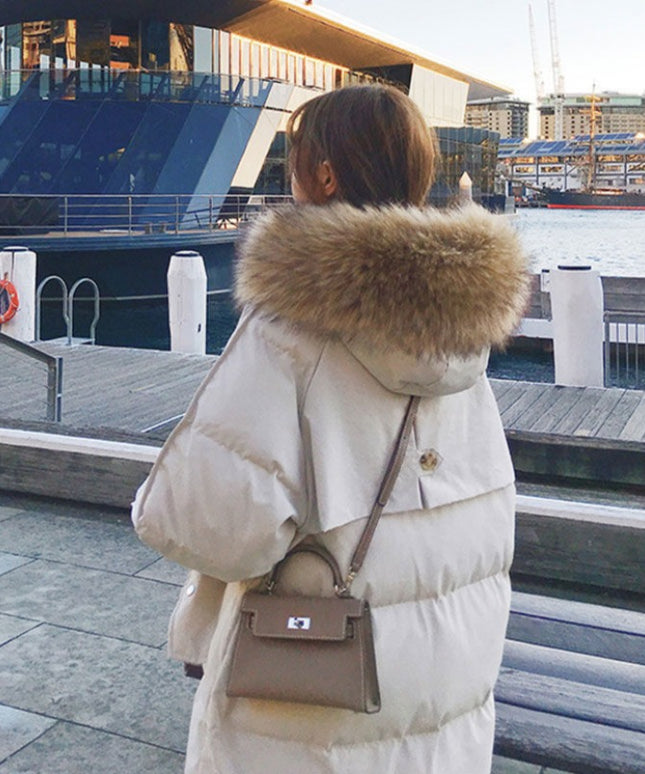 Damska kurtka zimowa ocieplana z kapturem długości przed kolano