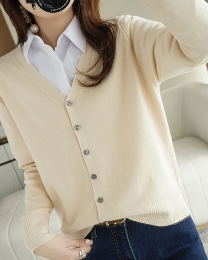 Damski sweter typu kardigan zapinany na guziki