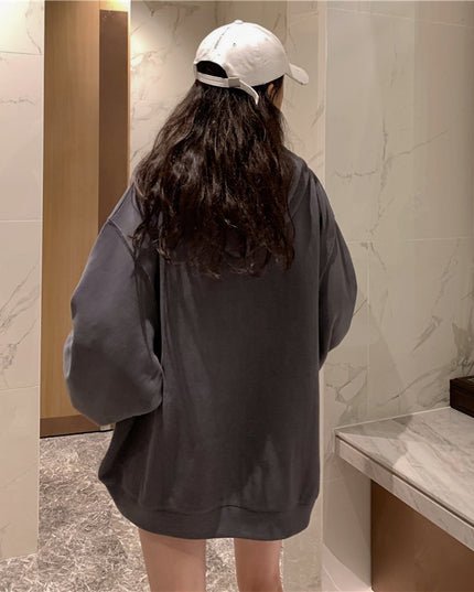 Damska bluza oversize rozpinana z kapturem i kieszeniami