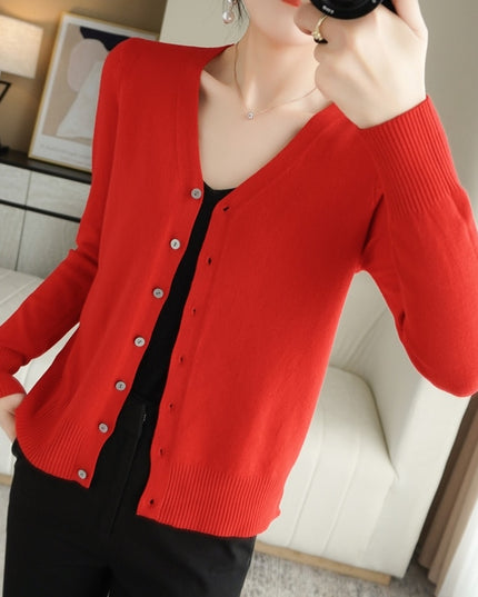 Damski sweter typu kardigan zapinany na guziki