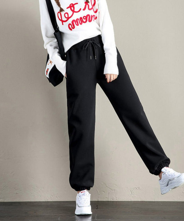 Damskie spodnie dresowe ocieplane