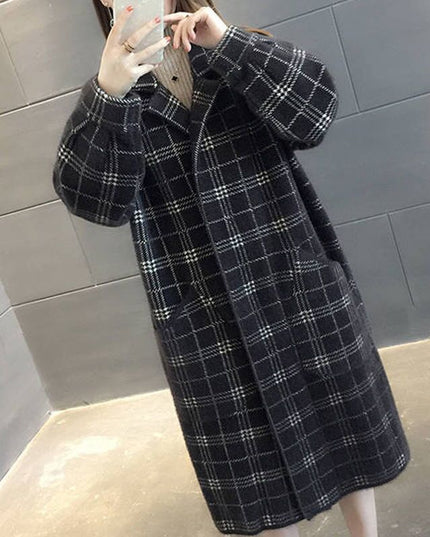 Damski płaszcz w kratę oversize z kieszeniami