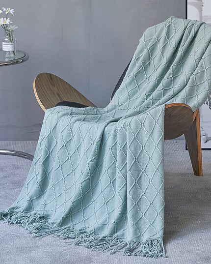 Koc z frędzlami i fakturą w romby