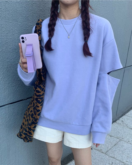 Damska bluza z rozcięciami na rękawach