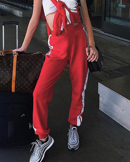 Damskie spodnie dresowe z białymi paskami po bokach