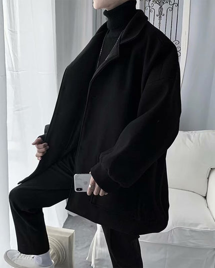 Męski płaszcz jednorzędowy oversize z kieszeniami