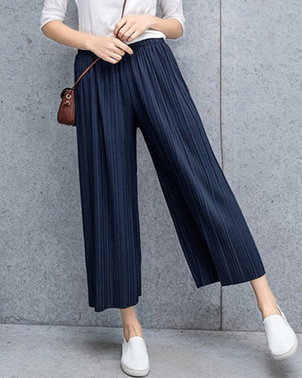 Damskie spodnie materiałowe długości 7/8