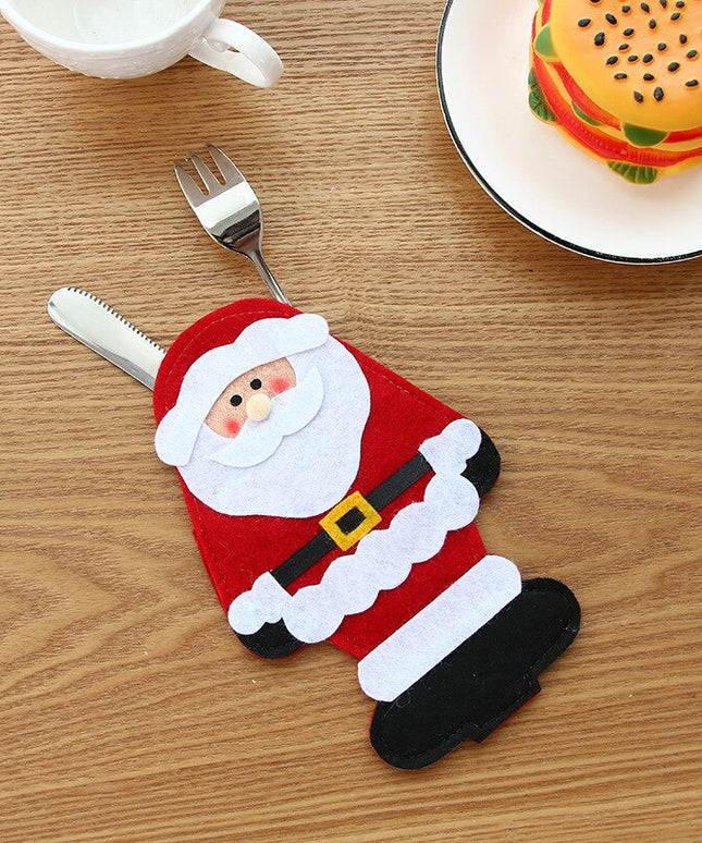 Świąteczny pokrowiec na sztućce w kształcie Mikołaja