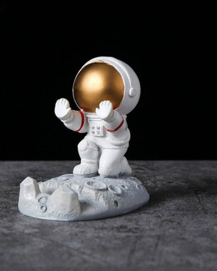 Figurka funkcjonalna astronauta uchwyt na telefon