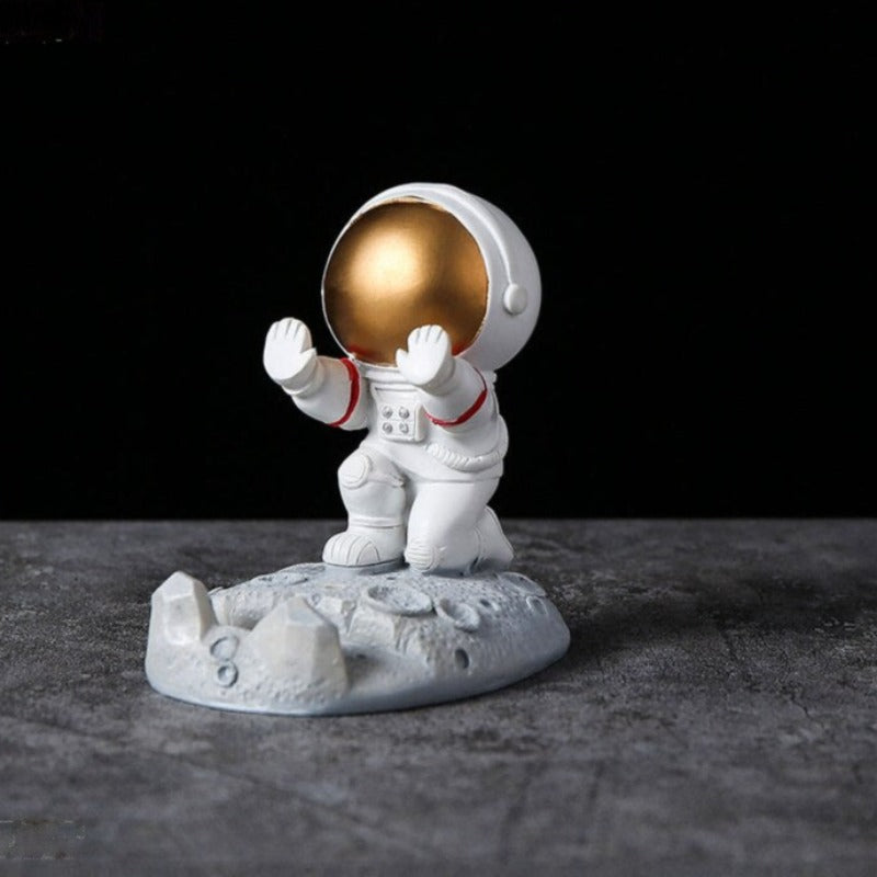 Figurka funkcjonalna astronauta uchwyt na telefon