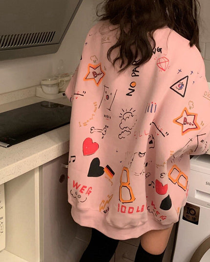 Damska bluza z nadrukami odręcznych rysunków