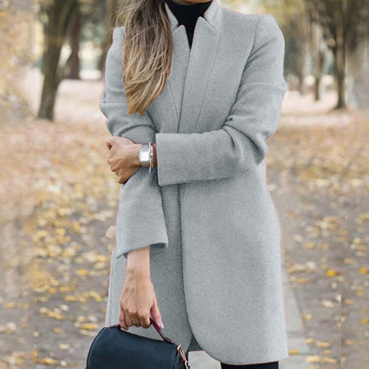 Damski płaszcz o prostym eleganckim kroju