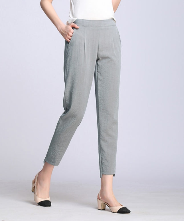 Damskie spodnie klasyczne chinosy z kieszeniami