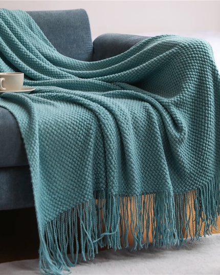 Dzianinowy koc z plecioną fakturą