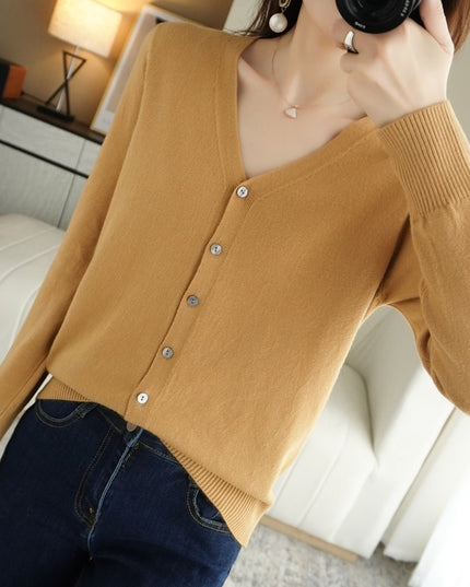 Damski sweter typu kardigan zapinany na guziki