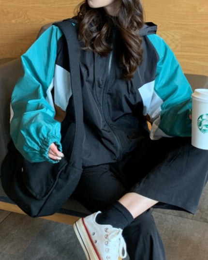 Damska kurtka przejściowa przeciwdeszczowa z kapturem o luźnym kroju