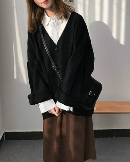 Damski sweter typu kardigan z szerokimi rękawami