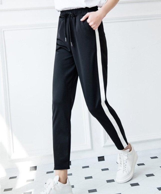 Damskie spodnie dresowe z prostymi nogawkami z białą lamówką