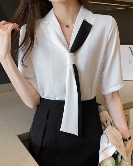 Damska koszula z ozdobnym krawatem