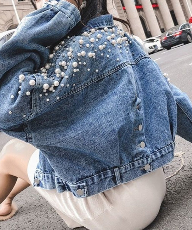 Damska kurtka jeansowa ze zdobieniem na plecach