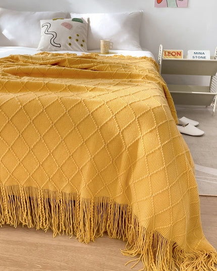 Koc z frędzlami z fakturą w romby