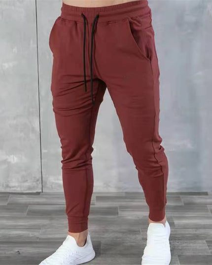 Męskie spodnie dresowe z wiązaniem i zwężanymi nogawkami