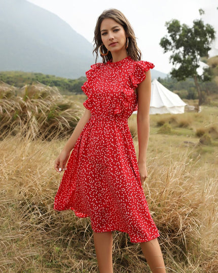 Letnia sukienka midi z falbankami w drobne wzory