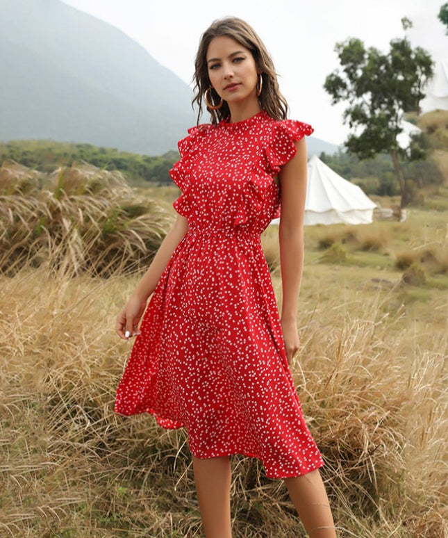 Letnia sukienka midi z falbankami w drobne wzory