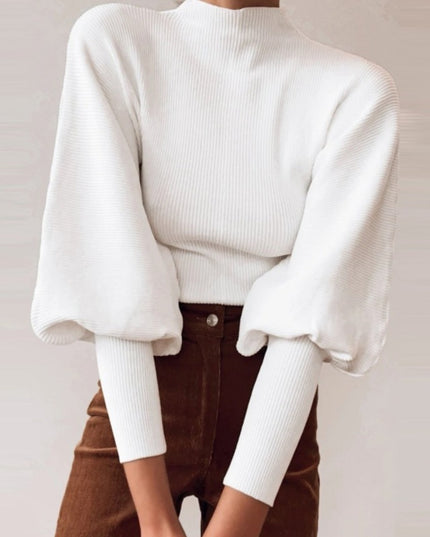 Damski sweter z golfem i bufiastymi rękawami