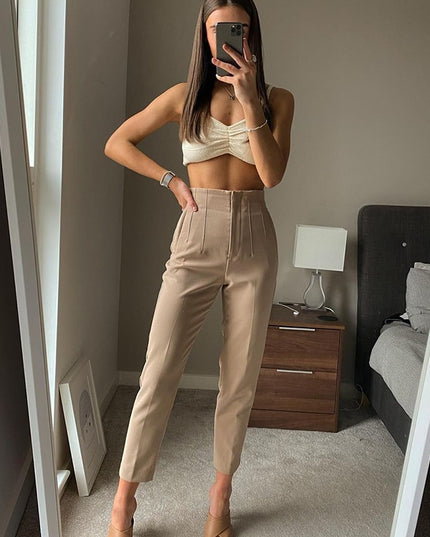Damskie spodnie chinosy z wysokim stanem podkreślające talię