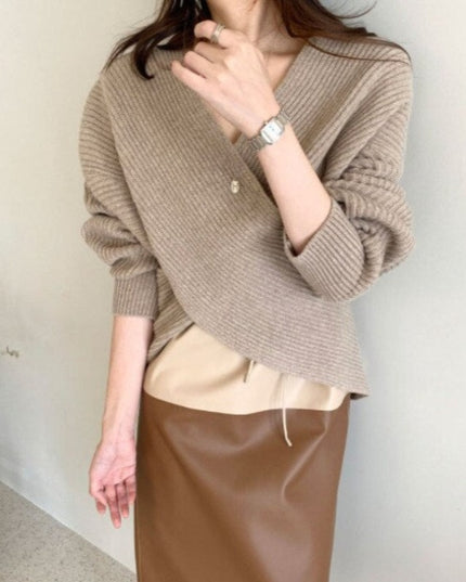 Damski sweter dziergany astymetryczny z bufiastymi rękawami