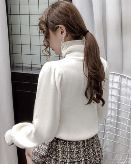 Damski sweter z golfem i bufiastymi rękawami