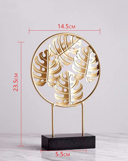 Figurka dekoracyjna liść w złotym kolorze