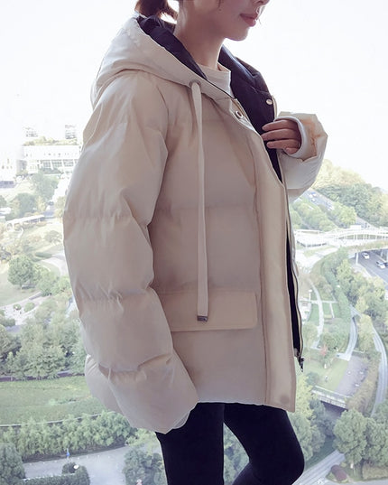 Damska kurtka zimowa z kapturem i kieszeniami