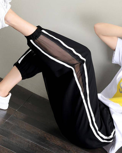 Damskie spodnie dresowe z ozdobną siateczką