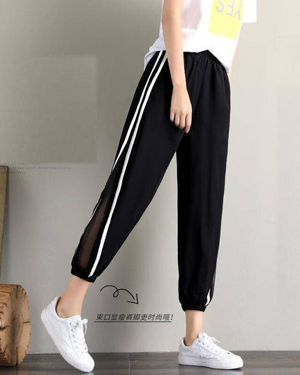 Damskie spodnie dresowe z ozdobną siateczką