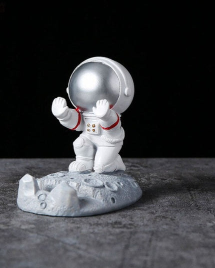 Figurka funkcjonalna astronauta uchwyt na telefon