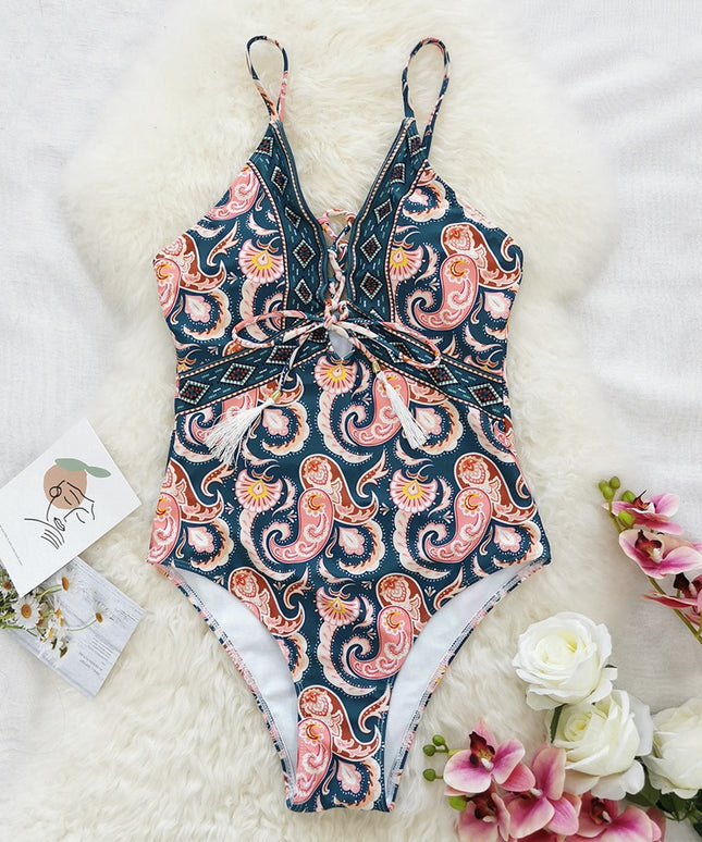 Damski jednoczęściowy strój kąpielowy z wiązanym dekoltem we wzory