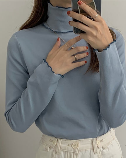 Damska koszulka z długim rękawem z golfem i falbanką