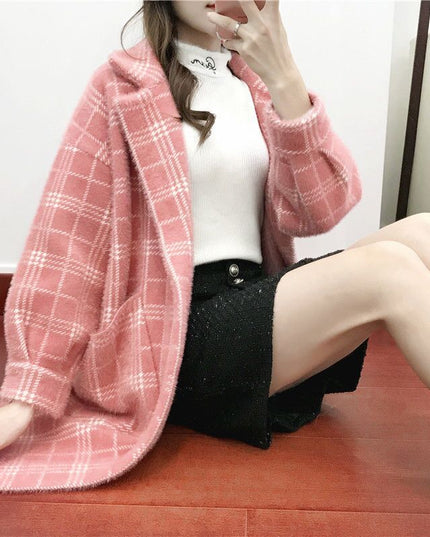 Damski płaszcz w kratę oversize z kieszeniami