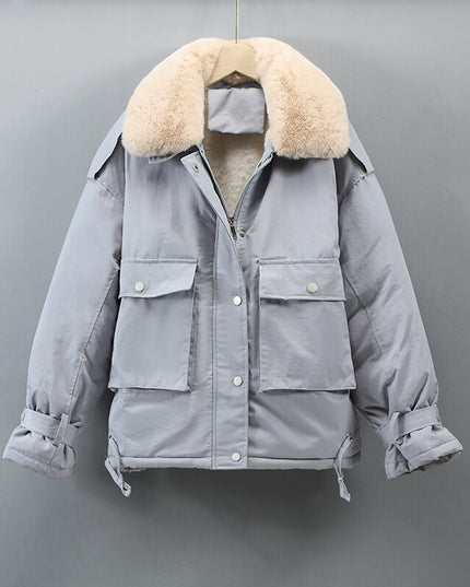 Damska kurtka zimowa o kroju parki z futrzanym kołnierzem