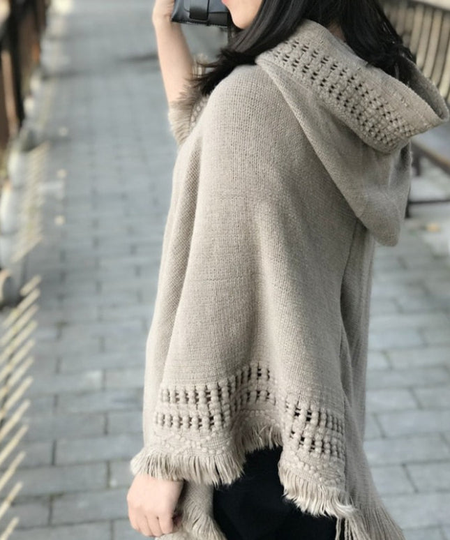 Damski sweter polarowy typu ponczo z frędzlami