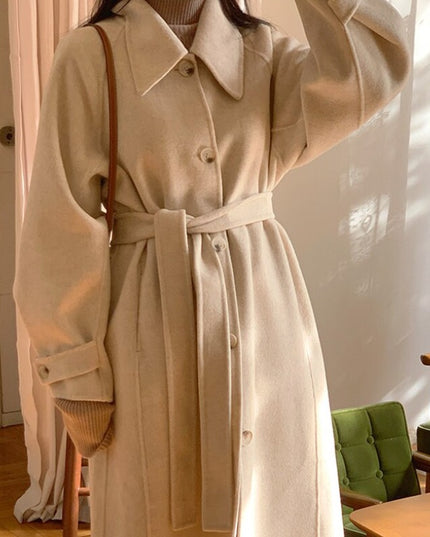 Damski długi płaszcz z wiązaniem w talii