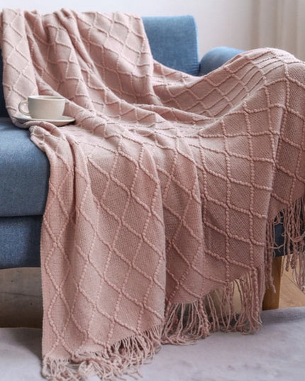 Koc z frędzlami i fakturą w romby