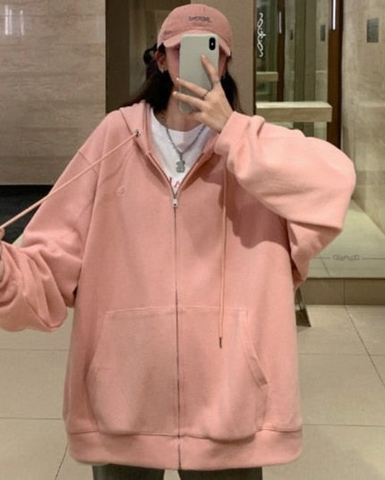 Damska bluza oversize rozpinana z kapturem i kieszeniami