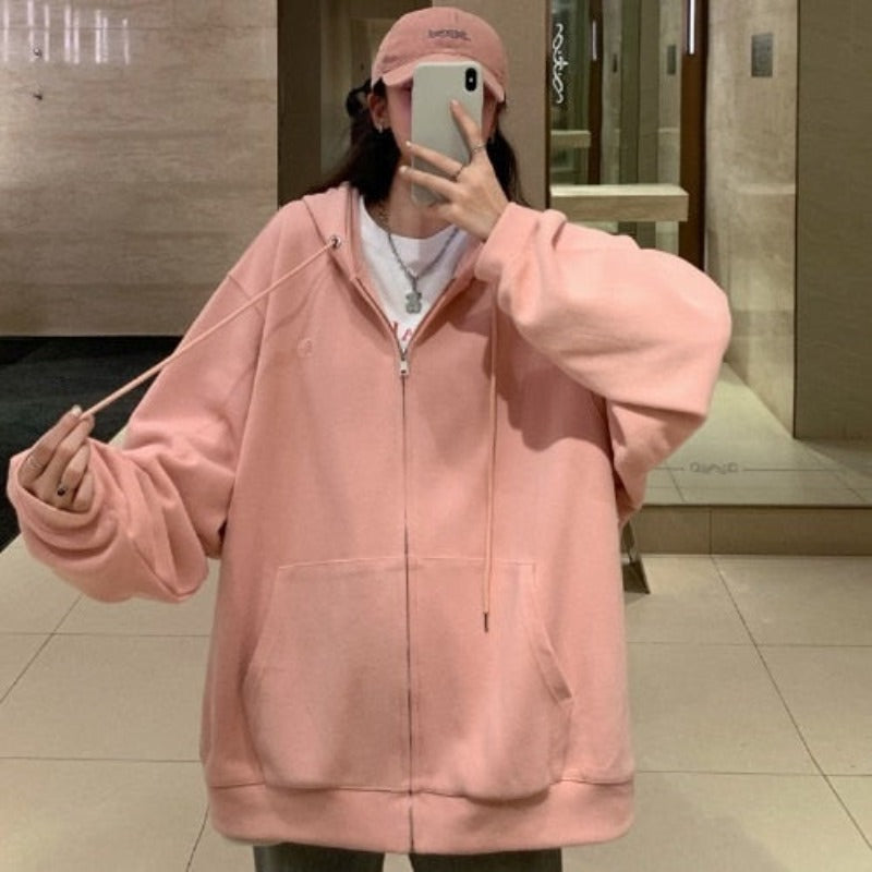 Damska bluza oversize rozpinana z kapturem i kieszeniami