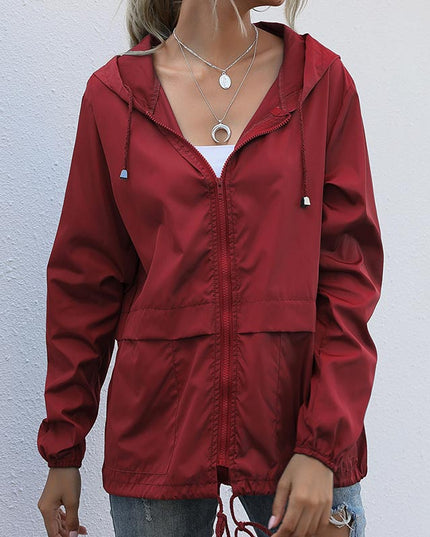 Damska kurtka przejściowa z kapturem wiązana w talii