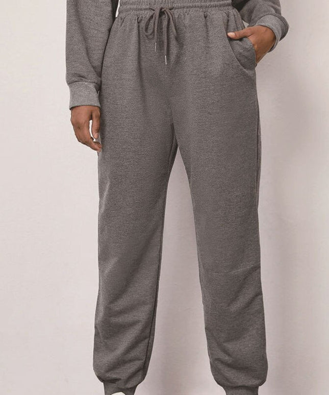 Damskie spodnie dresowe z wiązaniem i ściągaczami